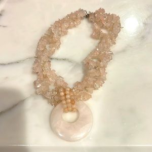 Rose Quartz necklace with large stone.